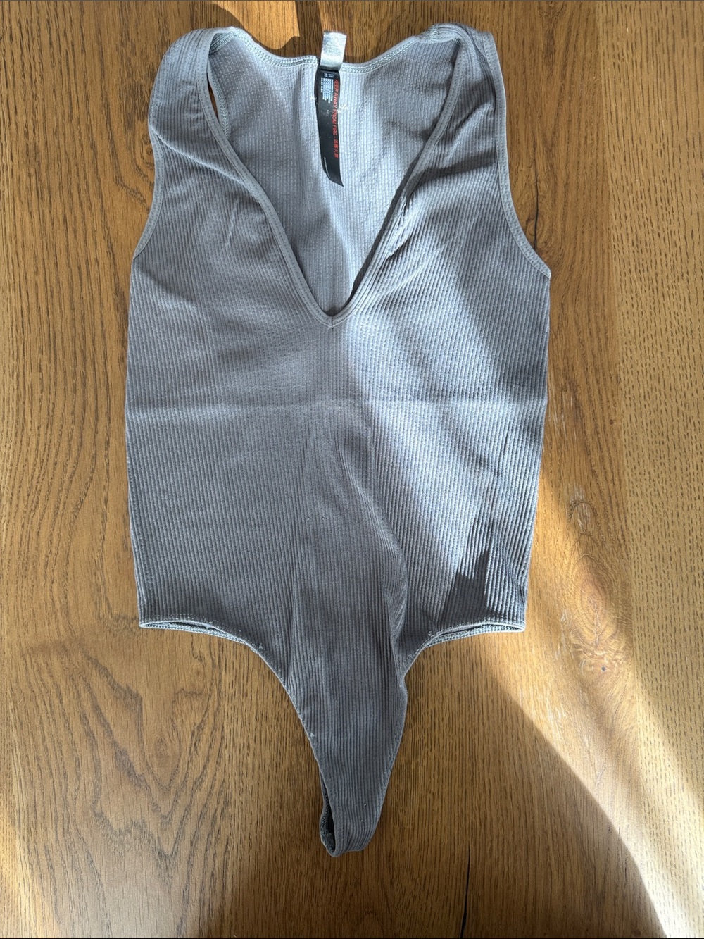 Urban Outfitters Gray Ribbed V‑Neck Bodysuit